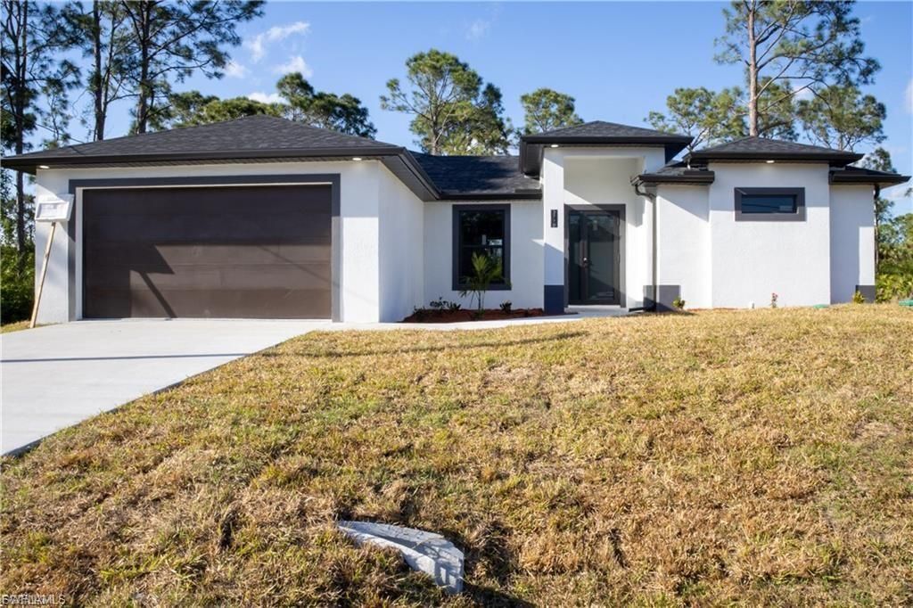 2716 2ND ST SW, LEHIGH ACRES, FL 33976 — exterior
