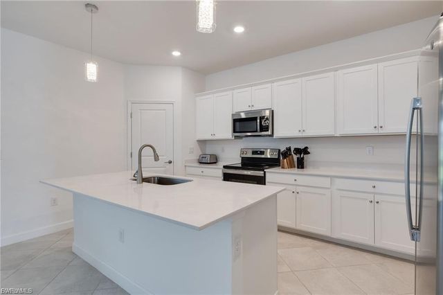 9146 Leatherwood LOOP, Lehigh Acres, FL 33936