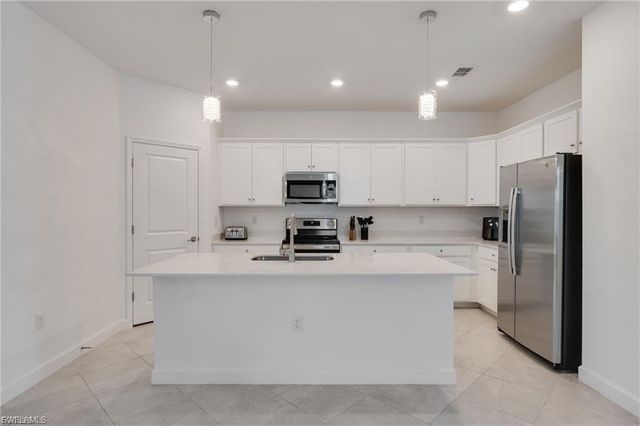 9146 Leatherwood LOOP, Lehigh Acres, FL 33936