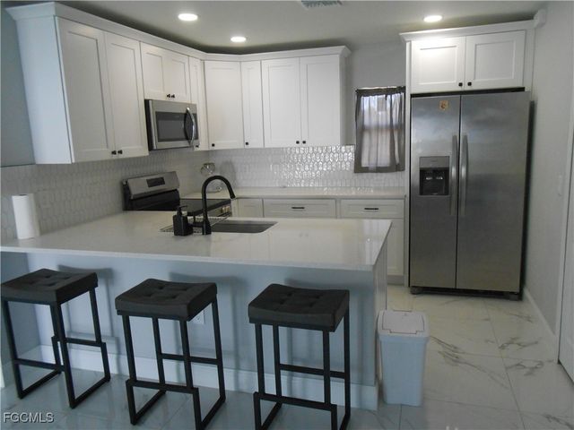 636 Eisenhower BLVD, Lehigh Acres, FL 33974