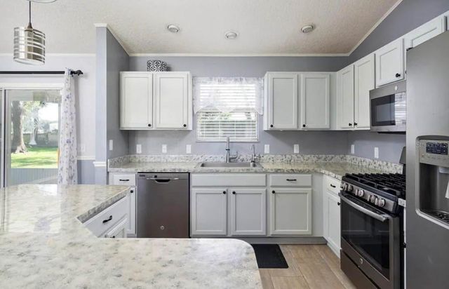 104 CHERRY BLOSSOM LANE, Lady Lake, FL 32159