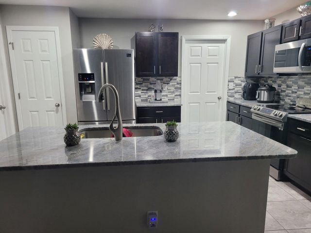 1413 NE 9TH Avenue, Cape Coral, FL 33909