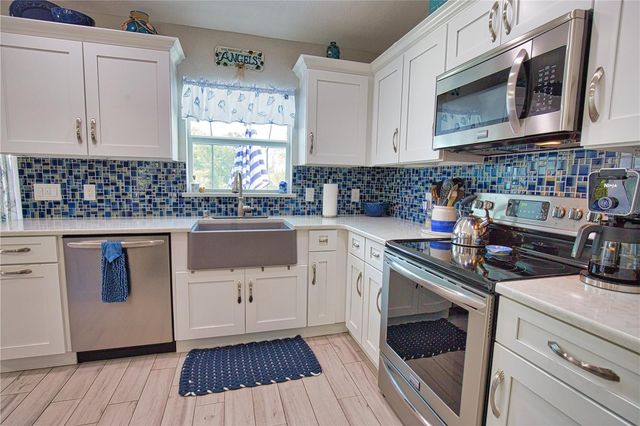 9081 BENSONHURST LN, Englewood, FL 34224