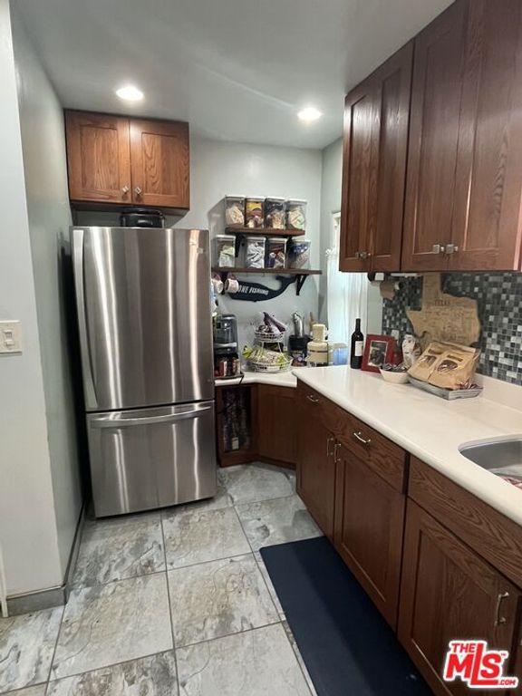 Image 7 of property listing at 1160 W 101st Street, Los Angeles, CA 90044