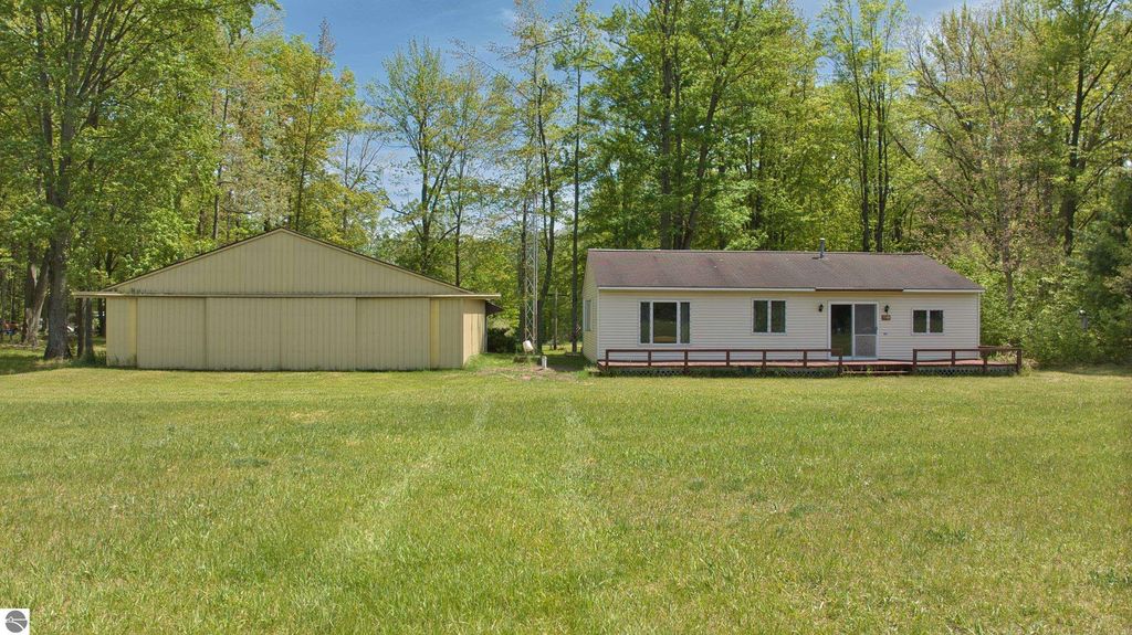Image 1 of property listing at 7768 S Airpark Road, Weidman, MI 48893