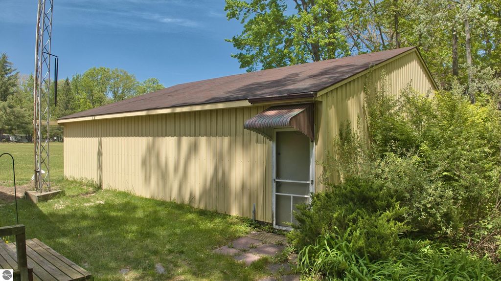 Image 12 of property listing at 7768 S Airpark Road, Weidman, MI 48893