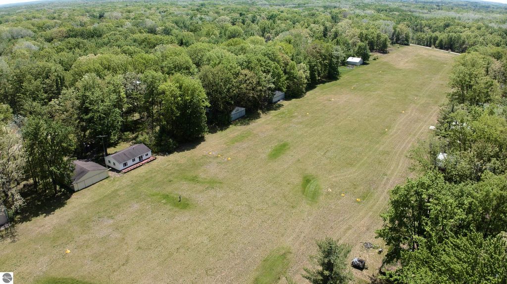 Image 24 of property listing at 7768 S Airpark Road, Weidman, MI 48893