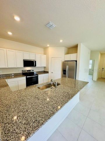 754 OVERPOOL AVENUE, Davenport, FL 33896
