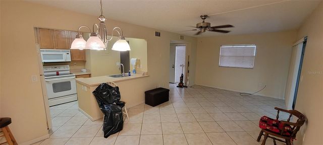 100 SWEETGUM WOODS COURT 12C, Deltona, FL 32725