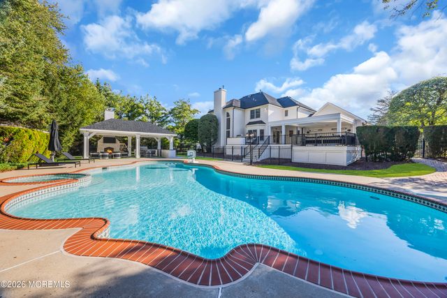 215 Navajo Court, Morganville, NJ 07751