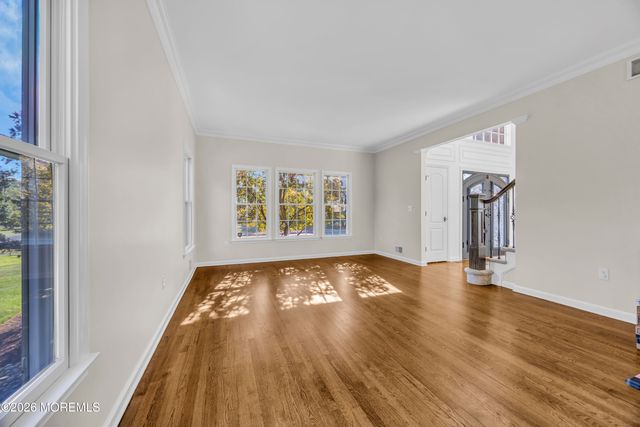 215 Navajo Court, Morganville, NJ 07751