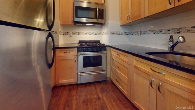 118-17 Union Turnpike 9J, Forest Hills, NY 11375