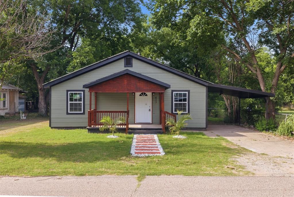 Image 1 of property listing at 413 SE 3rd Street, Ardmore, OK 73401