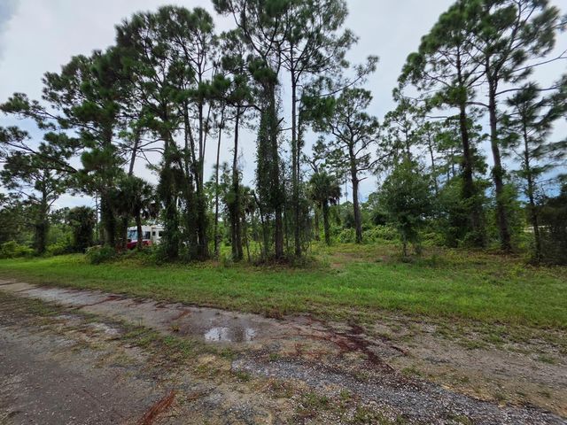 418 Lampion Ave, Lehigh Acres, FL 33974