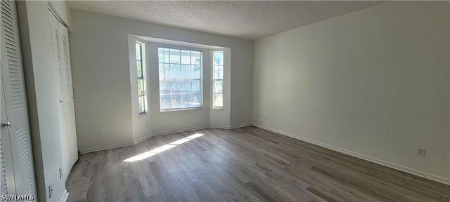 1390 Wildwood Lakes BLVD 8, Naples, FL 34104