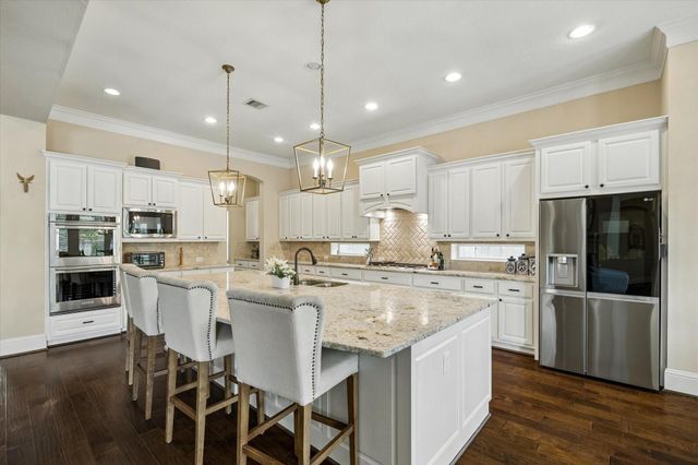 123 N Thatcher Bend Circle, The Woodlands, TX 77389