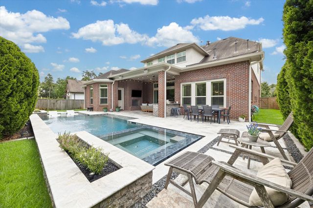 123 N Thatcher Bend Circle, The Woodlands, TX 77389