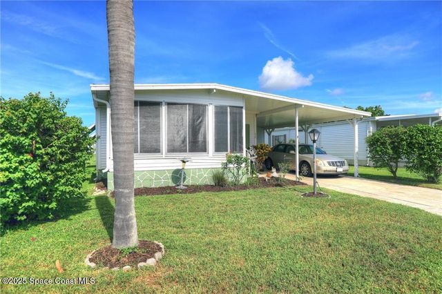 912 Oriole Circle, Barefoot Bay, FL 32976