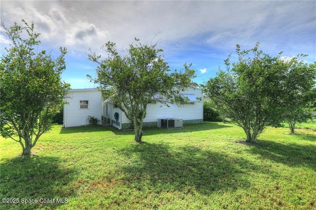 912 Oriole Circle, Barefoot Bay, FL 32976