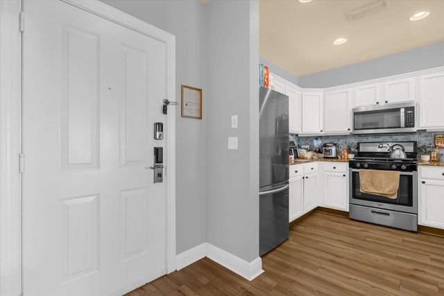 1311 SEVEN EAGLES COURT 302, Reunion, FL 34747