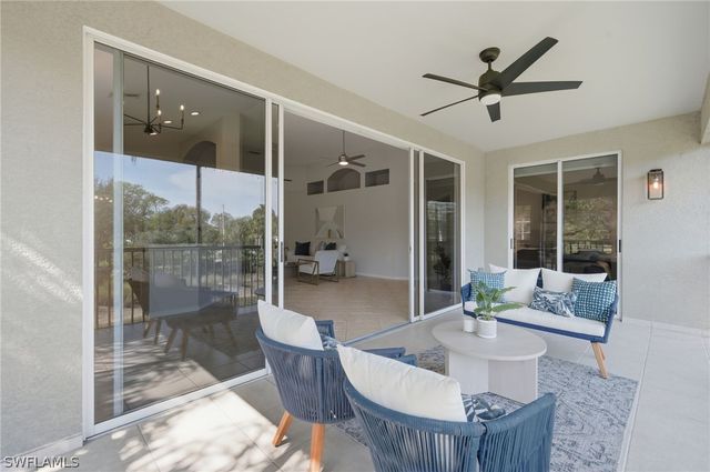 7134 Blue Juniper CT 202, Naples, FL 34109