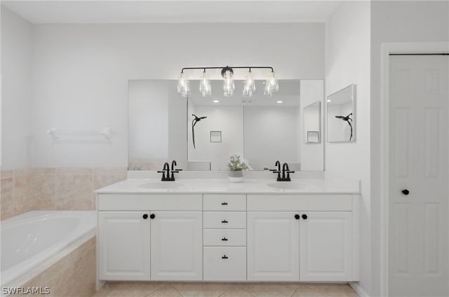 7134 Blue Juniper CT 202, Naples, FL 34109