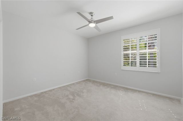 7134 Blue Juniper CT 202, Naples, FL 34109