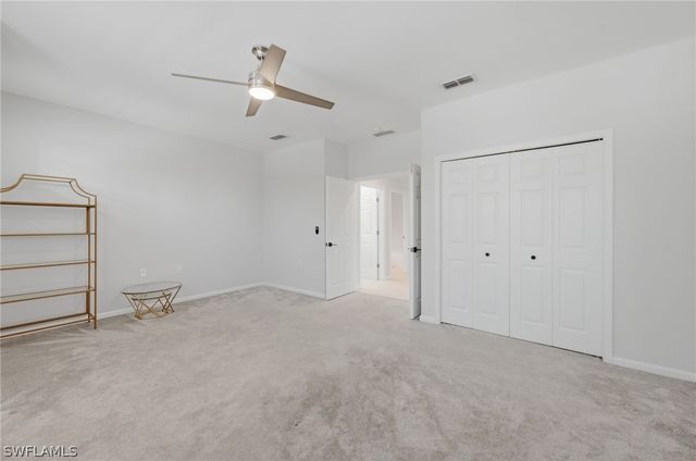 7134 Blue Juniper CT 202, Naples, FL 34109