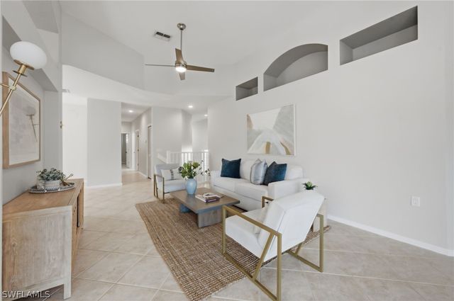 7134 Blue Juniper CT 202, Naples, FL 34109