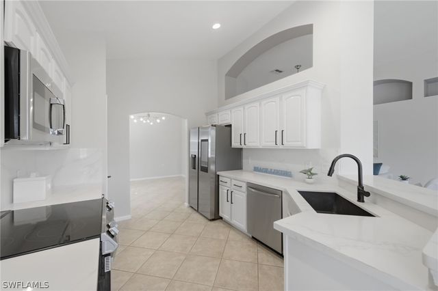 7134 Blue Juniper CT 202, Naples, FL 34109