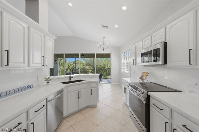 7134 Blue Juniper CT 202, Naples, FL 34109