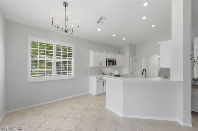 7134 Blue Juniper CT 202, Naples, FL 34109