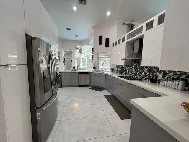 9963 NW 64th Ct, Parkland, FL 33076