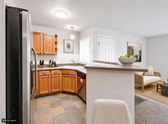 10734 W 63rd Place 104, Arvada, CO 80004