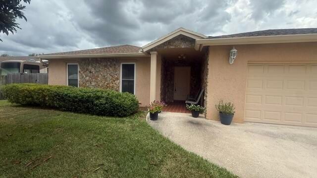 255 SANDPIPER Avenue, Royal Palm Beach, FL 33411
