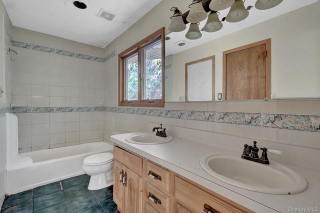56 E Bartlett Road, Middle Island, NY 11953
