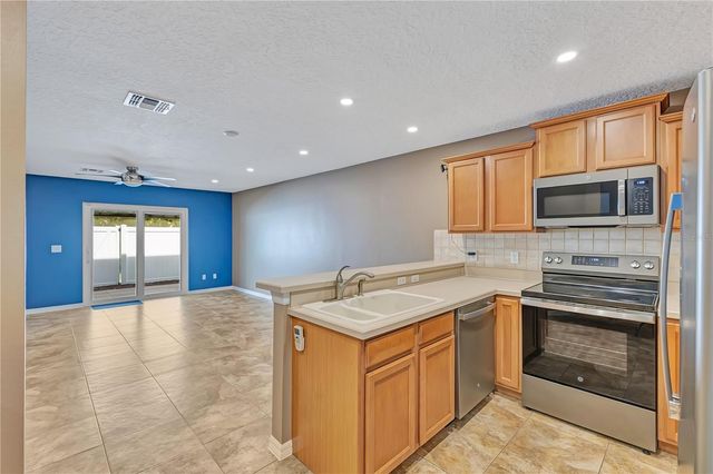 942 COQUINA ROCK STREET, Orlando, FL 32828