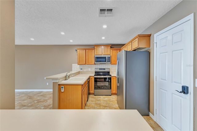 942 COQUINA ROCK STREET, Orlando, FL 32828