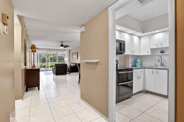 4030 W Palm Aire Dr 105, Pompano Beach, FL 33069