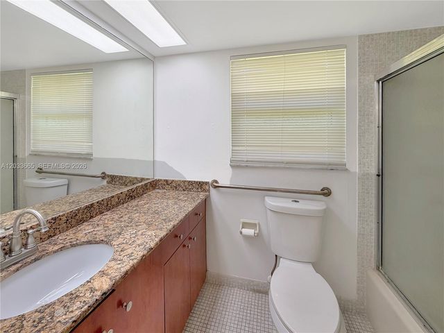 3641 Oaks Clubhouse Drive 201, Pompano Beach, FL 33069