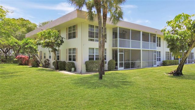 3641 Oaks Clubhouse Drive 201, Pompano Beach, FL 33069