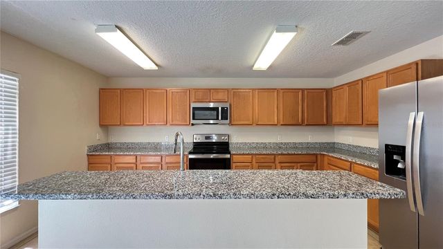 216 VERDI STREET, Davenport, FL 33896