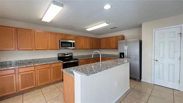 216 VERDI STREET, Davenport, FL 33896