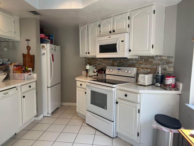 13 Uno Lago Drive, Juno Beach, FL 33408