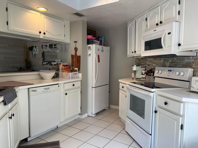 13 Uno Lago Drive, Juno Beach, FL 33408