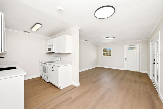 2115 WOODLAND BOULEVARD, Leesburg, FL 34748