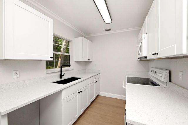 2115 WOODLAND BOULEVARD, Leesburg, FL 34748