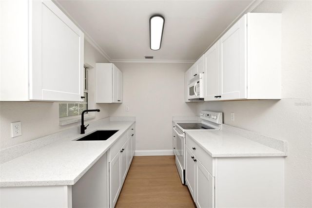 2115 WOODLAND BOULEVARD, Leesburg, FL 34748