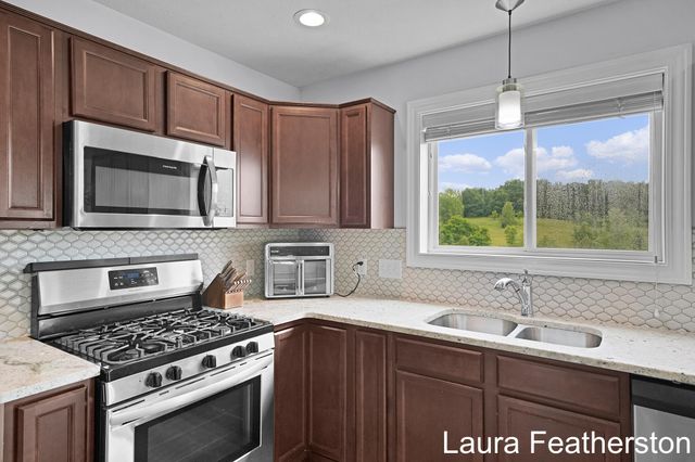 11740 Ridge Water Drive NE, Sparta, MI 49345