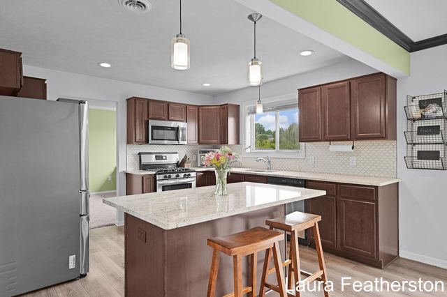 11740 Ridge Water Drive NE, Sparta, MI 49345
